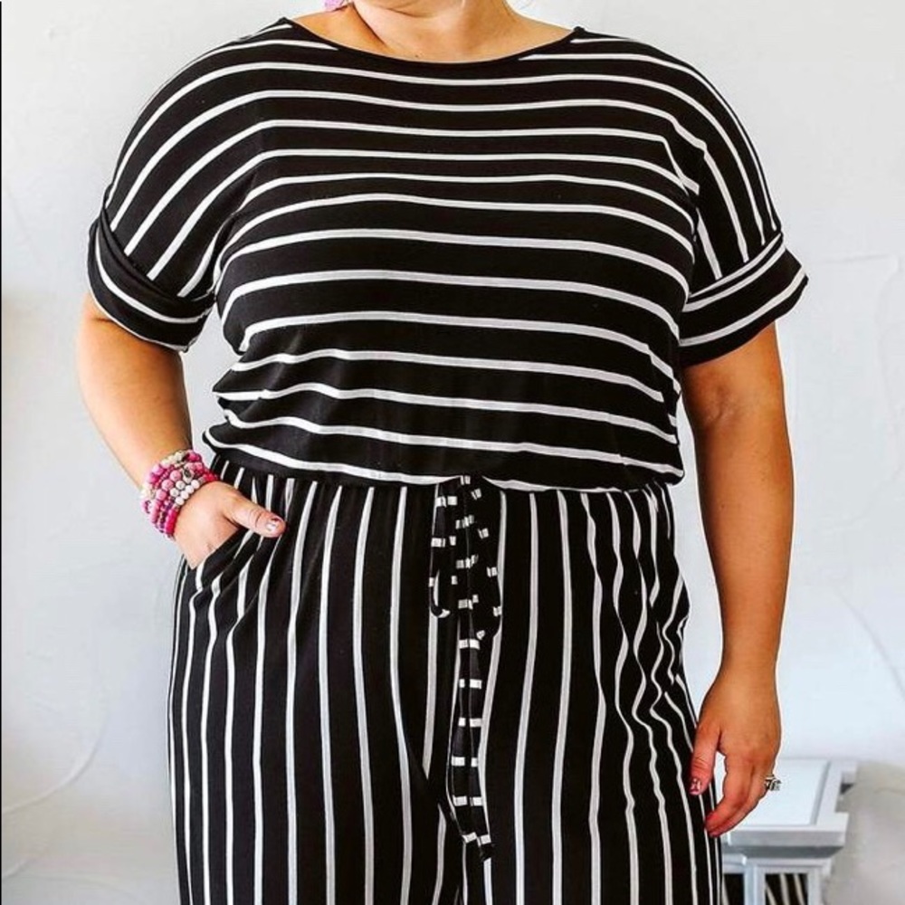 NWOT Boutique Romper. Pics show boutique model.